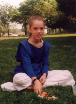 Elissa sits on the lawn at Truro after dancing